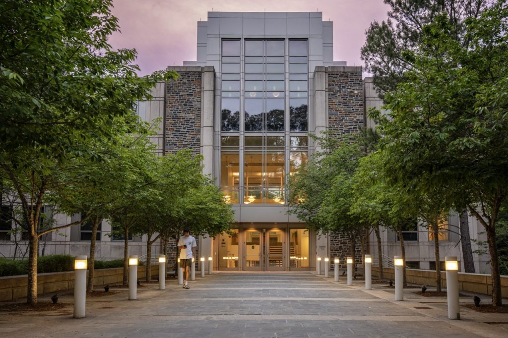 Fuqua School of Business building at dusk